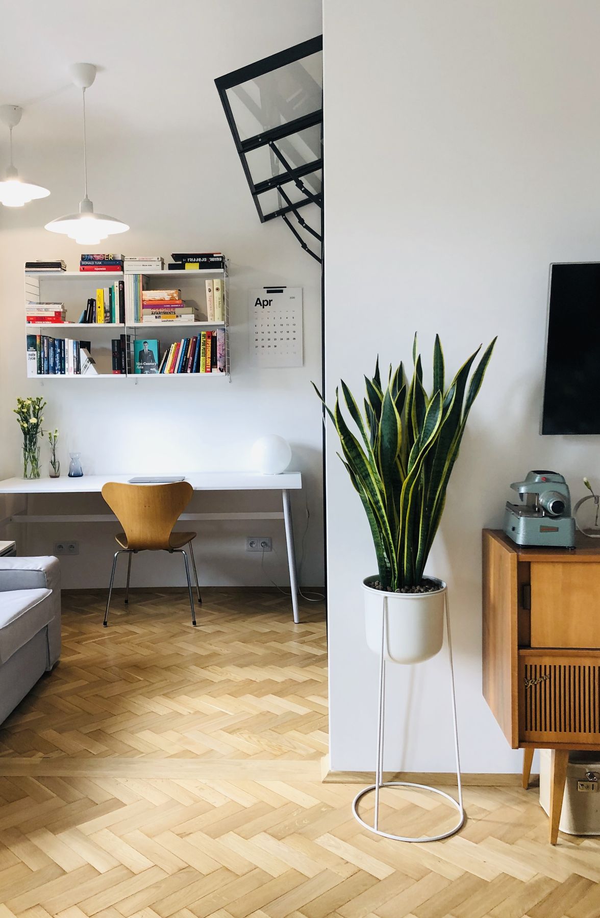 Living room — herringbone floor and staircase